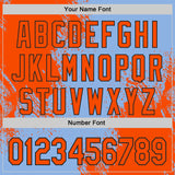 Custom Light Blue Orange-Black Abstract Brush Stroke Authentic Baseball Jersey