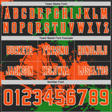 Custom Black Orange Grass Green-White Authentic Skull Paint Splatter Football Jersey