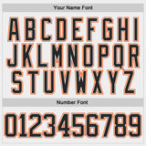 Custom White Black-Orange Stars Paint Splatter Brush Stroke Lace Neck Hockey Jersey