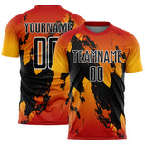 Custom Red Black Gold-White Gradient Splash Sublimation Soccer Uniform Jersey