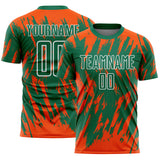 Custom Kelly Green Orange-White Splatter Torn Sharp Brush Stroke Sublimation Soccer Uniform Jersey