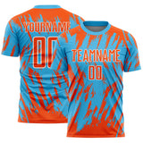 Custom Sky Blue Orange-White Splatter Torn Sharp Brush Stroke Sublimation Soccer Uniform Jersey
